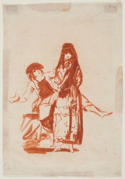 Man gesticulating behind a woman