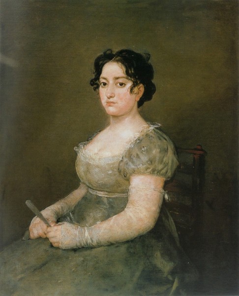 Mujer joven con abanico